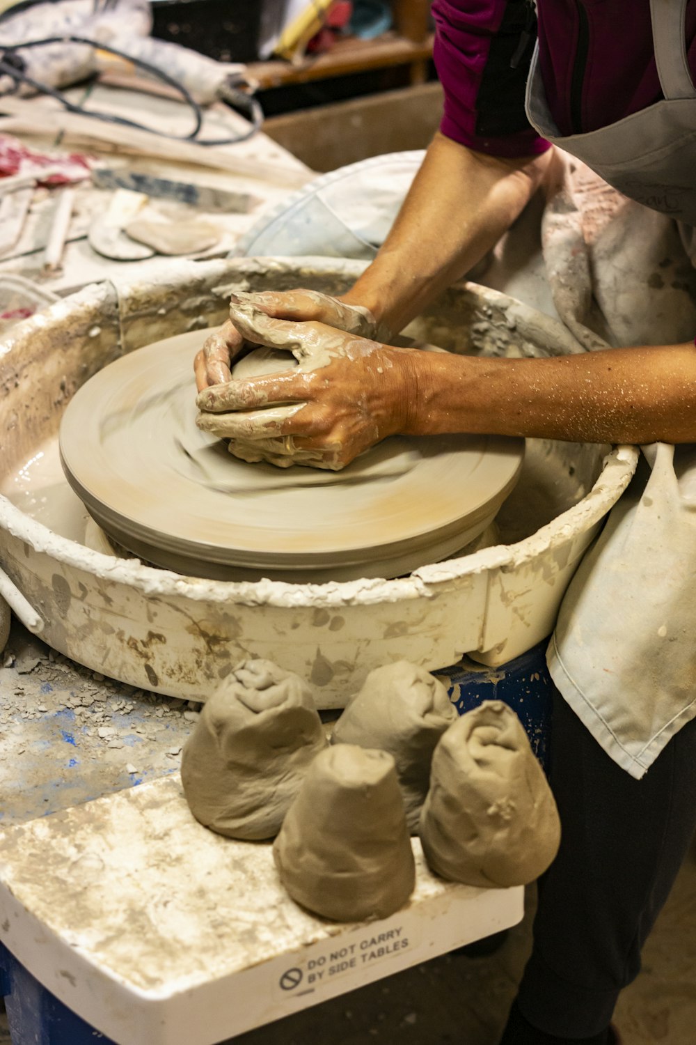 Illustrative pottery making for custom ceramic work — temporary reference photograph